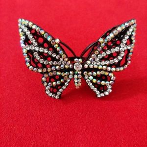 Butterfly fashion ring large covering 3 fingers.
